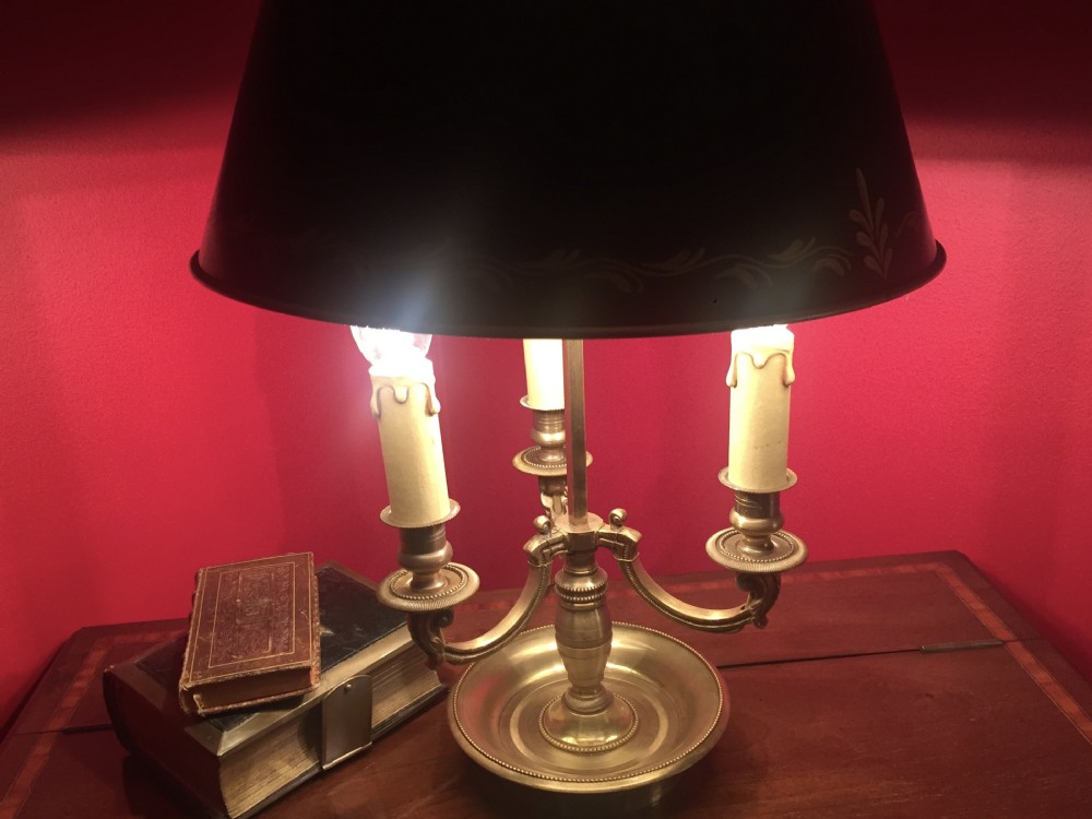 A traditional bronze bouillotte desk lamp featuring candle-style lights, a dish base, and an adjustable dark green painted tole shade with gold leaf accents. View III