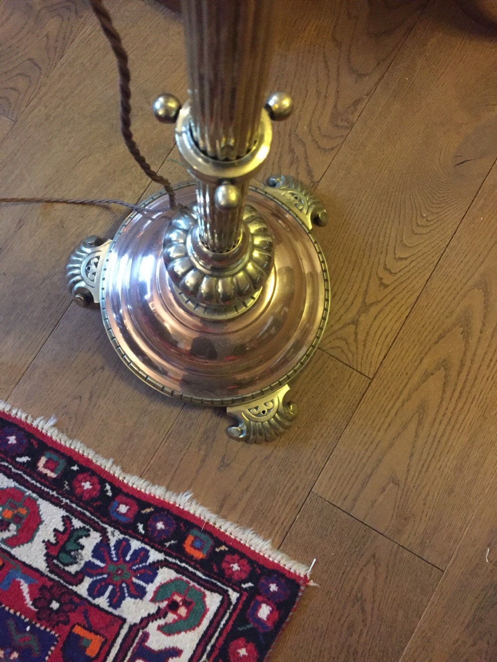 A Victorian telescopic standard lamp with a fluted brass column, height adjustment collar, and a polished copper domed base supported by cast metal feet. View VIII