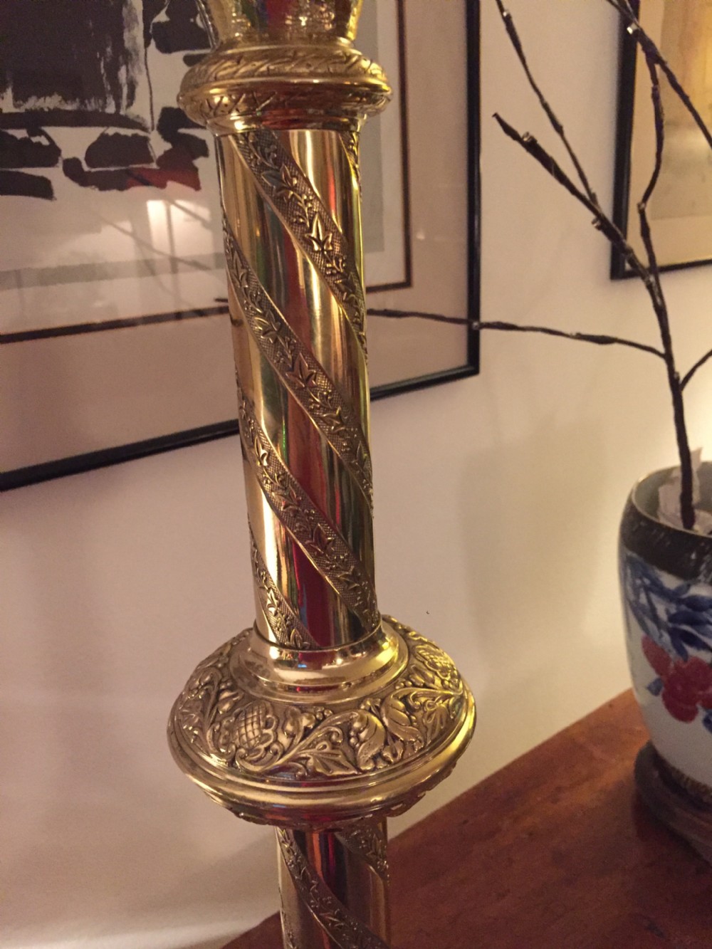 A 19th-century French brass altar candlestick converted into a table lamp, featuring an ornate tri-form base and a spiral-fluted column. View V