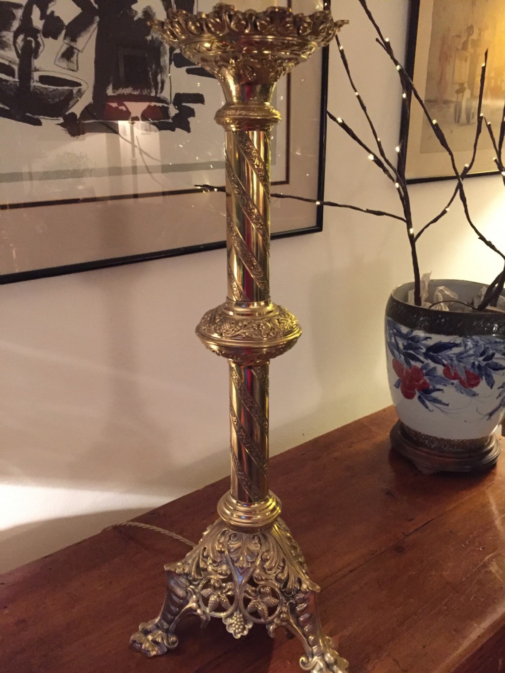 A 19th-century French brass altar candlestick converted into a table lamp, featuring an ornate tri-form base and a spiral-fluted column. View VII