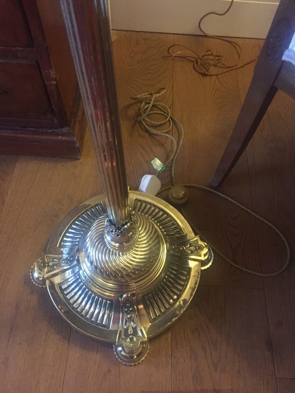 An antique Victorian telescopic standard lamp crafted in polished brass featuring an adjustable stem, a mid-tier pink felt circular tray, and a gadrooned circular base. View XIII