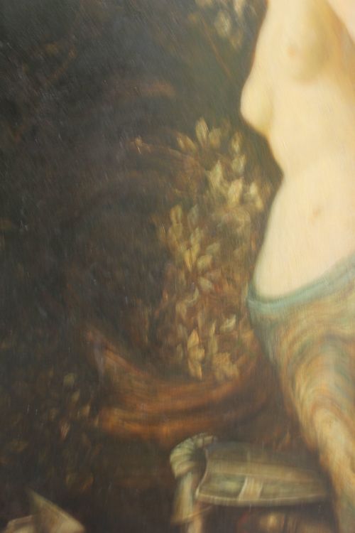 fig 4. A large vertical Pre-Raphaelite oil painting depicting a knight in armour gazing up at a woman, set within an ornate carved gilt frame.