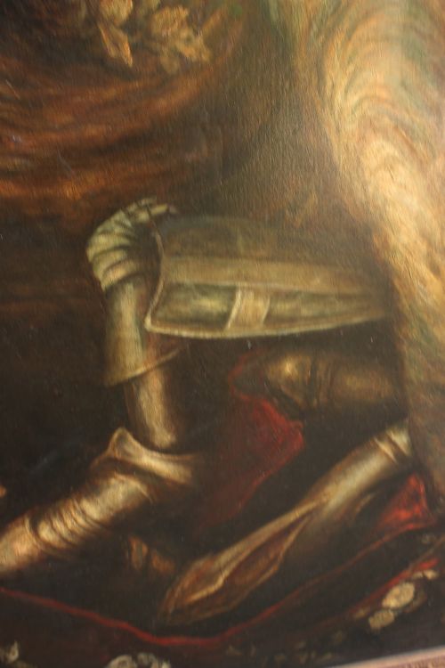 fig 8. A large vertical Pre-Raphaelite oil painting depicting a knight in armour gazing up at a woman, set within an ornate carved gilt frame.
