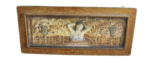 fig 1. A rectangular Arts and Crafts polychrome plaster relief featuring a central classical figure framed by trees and inscribed Ave Epicurus within a gilt frame.
