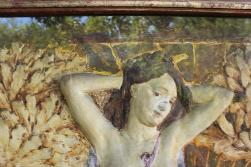 fig 5. A rectangular Arts and Crafts polychrome plaster relief featuring a central classical figure framed by trees and inscribed Ave Epicurus within a gilt frame.