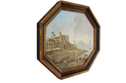 fig 2. An early nineteenth-century octagonal oil painting depicting a harbour scene in Rio de Janeiro, housed in a moulded gilt and ebonised wooden frame.