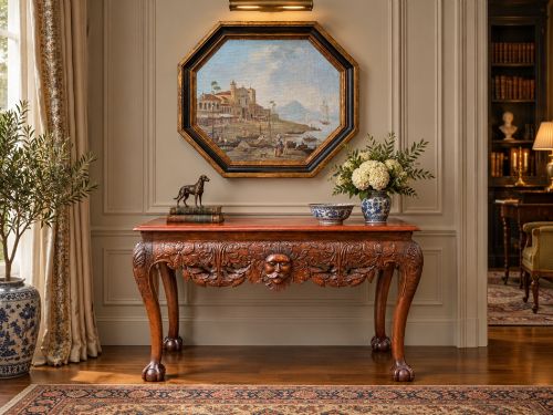 fig 6. An early nineteenth-century octagonal oil painting depicting a harbour scene in Rio de Janeiro, housed in a moulded gilt and ebonised wooden frame.