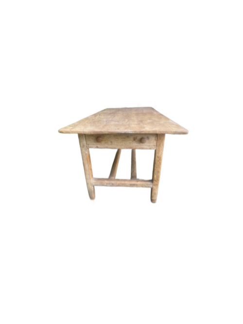 fig 7. A 19th century rectangular Irish pine farmhouse table featuring square legs, lower H-stretchers, and a warm timber finish.