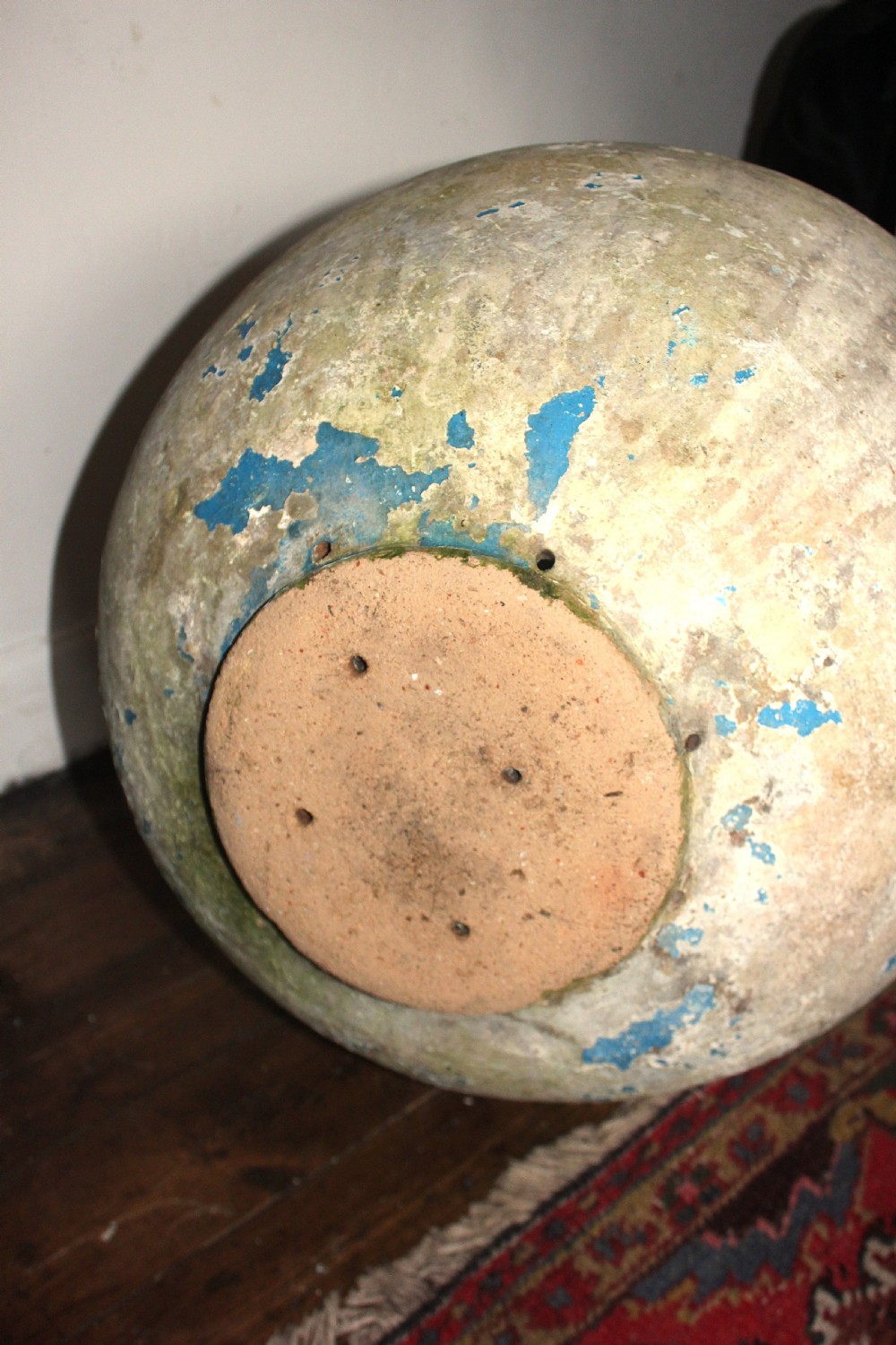 A 19th-century French terracotta Biot jar featuring an unglazed weathered body and a round lip finished with yellow glaze. View III