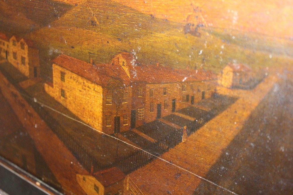 An 18th-century naive topographical oil painting of Staplecross in Sussex depicting village roads, buildings, and a windmill in a dark wooden frame. View IV