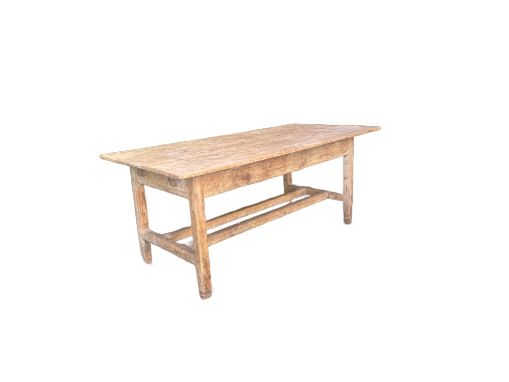 A 19th century rectangular Irish pine farmhouse table featuring square legs, lower H-stretchers, and a warm timber finish. View X