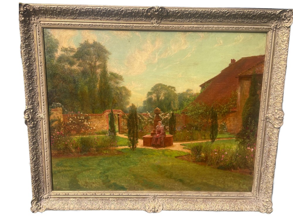 An antique oil painting depicting a woman seated in a walled garden surrounded by trees and a country house, set in an ornate gilded frame.