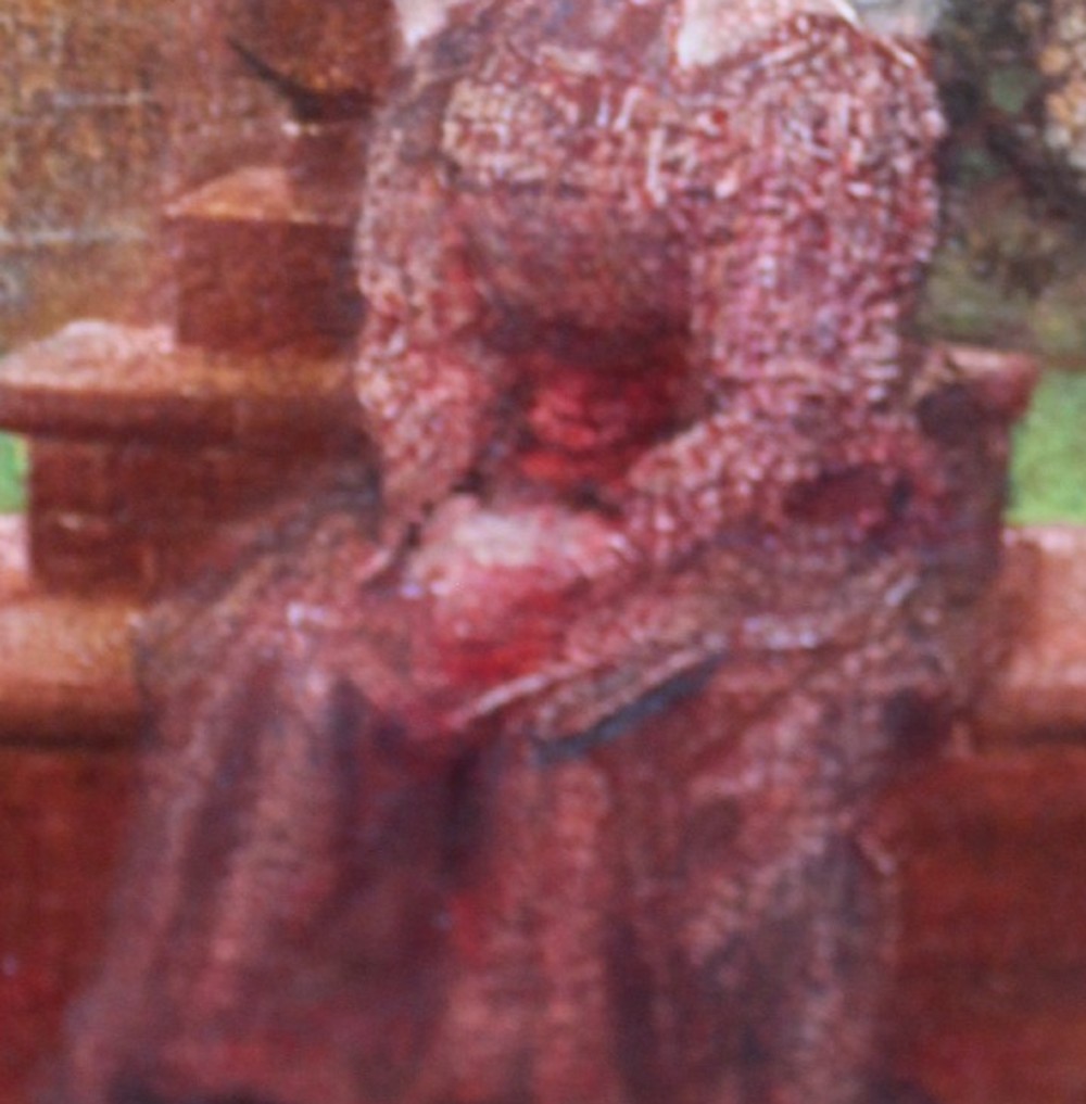 An antique oil painting depicting a woman seated in a walled garden surrounded by trees and a country house, set in an ornate gilded frame. View IX