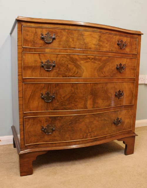 Figured Walnut Serpentine Chest of Drawers,
