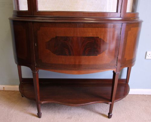 fig 1. Antique Mahogany Bow Front Display Cabinet. Maple & Co