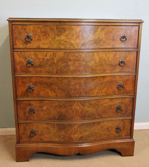 Burr Walnut Serpentine Front Chest of Drawers.