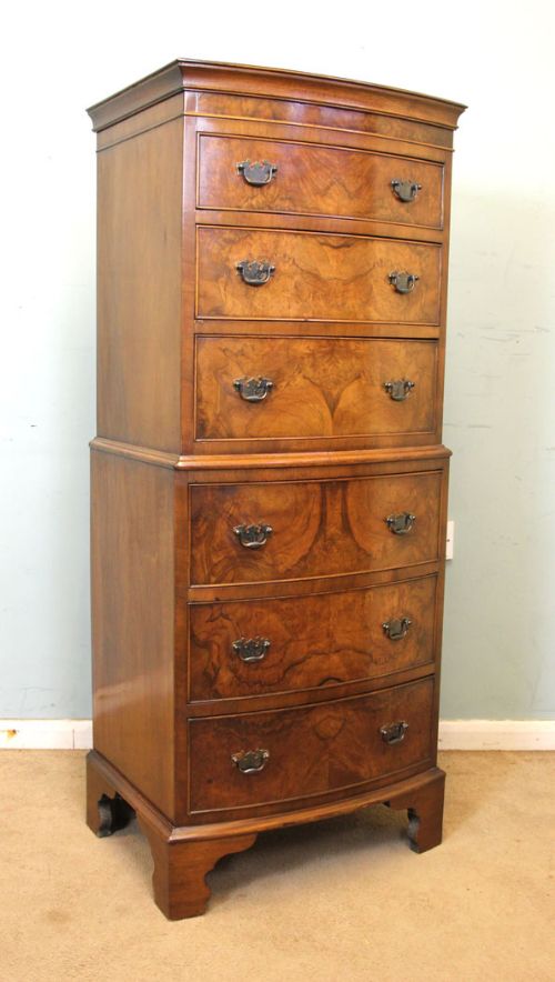 Slim Bow Front Burr Walnut Chest on Chest.