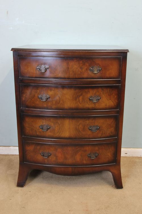 Small Walnut Bow Front Chest of Drawers.
