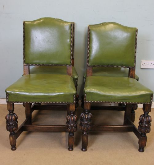 fig 1. Four Padded Back Country Oak Dining Chairs.