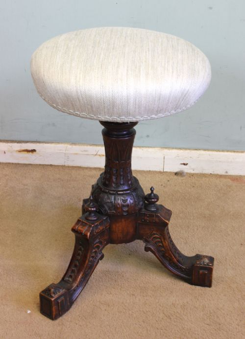 Antique Walnut Adjustable Piano Stool.