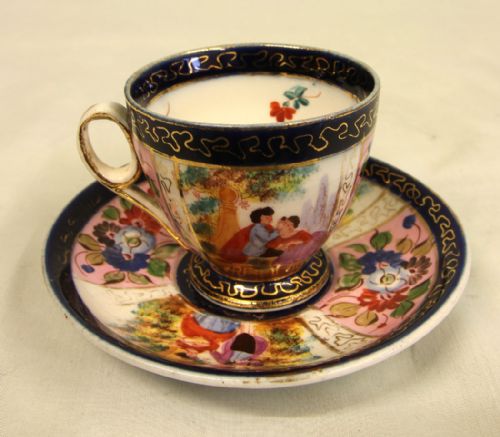 Pair of Pretty Small Cups & Saucers