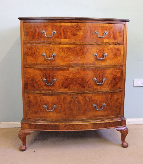 Antique Bow Front Figured Walnut Chest of Drawers.