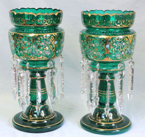 fig 1. A pair of Victorian emerald green glass mantle lustres featuring hand-painted floral gilt decoration and clear faceted cut crystal prisms.