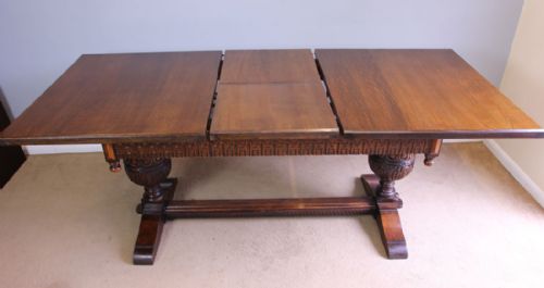fig 1. Antique Oak Draw Leaf Extending Dining Table.