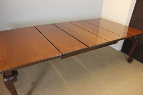 ANTIQUE MAHOGANY WIND OUT EXTENDING DINING TABLE - ADDITIONAL PHOTO 1