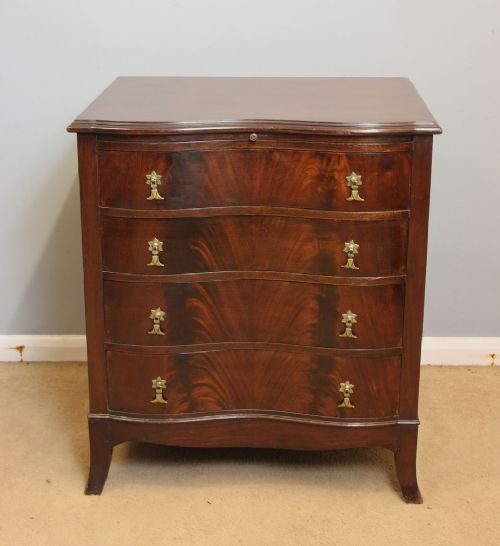 Antique Small Serpentine Mahogany Chest of Drawers.