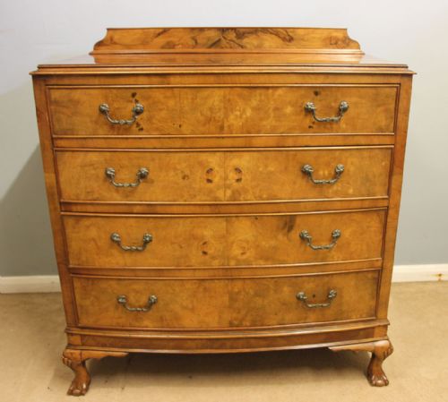ANTIQUE FIGURED WALNUT BOW FRONT CHEST OF DRAWERS