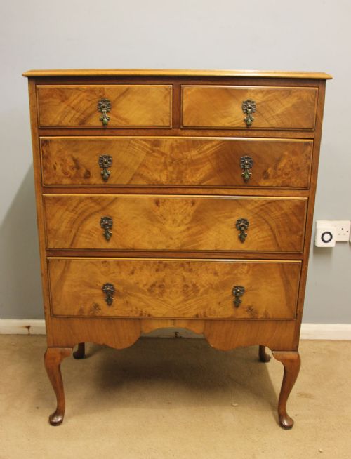 ANTIQUE FIGURED WALNUT CHEST OF DRAWERS