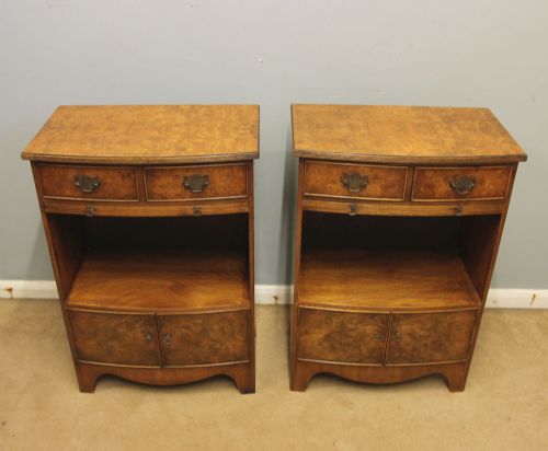 fig 1. A pair of antique burr walnut bedside cabinets featuring top drawers, pull-out slides, open middle shelves, and double-door lower cupboards.