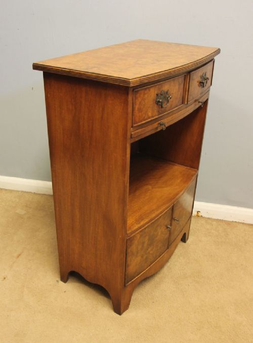 A pair of antique burr walnut bedside cabinets featuring top drawers, pull-out slides, open middle shelves, and double-door lower cupboards. View X