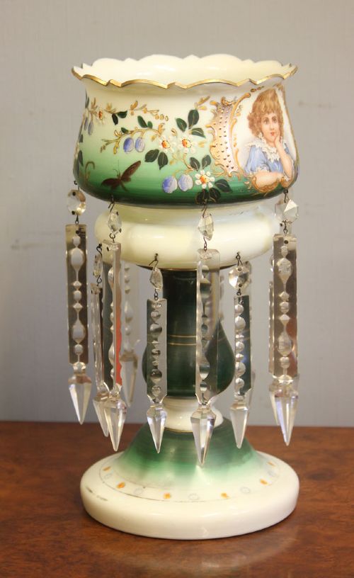 A Victorian opaque white and green glass mantle lustre featuring a hand-painted portrait vignette of a child, floral enamel accents, and suspended crystal prisms. View IV