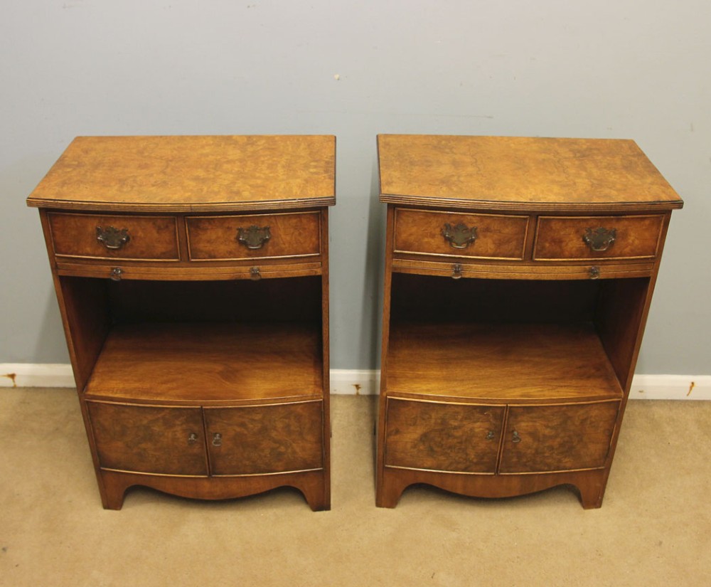 A pair of antique burr walnut bedside cabinets featuring top drawers, pull-out slides, open middle shelves, and double-door lower cupboards. View II