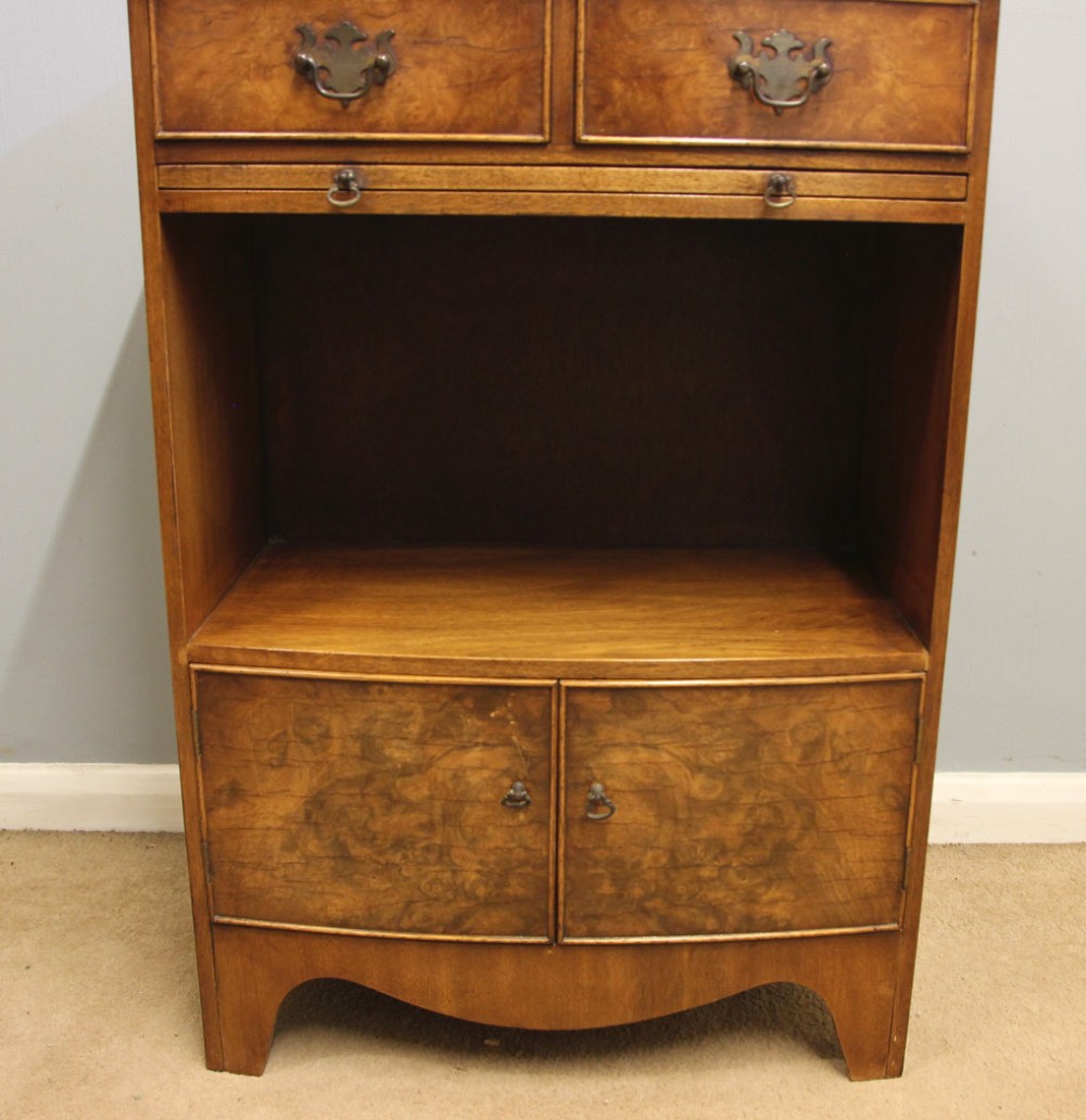 A pair of antique burr walnut bedside cabinets featuring top drawers, pull-out slides, open middle shelves, and double-door lower cupboards. View VII