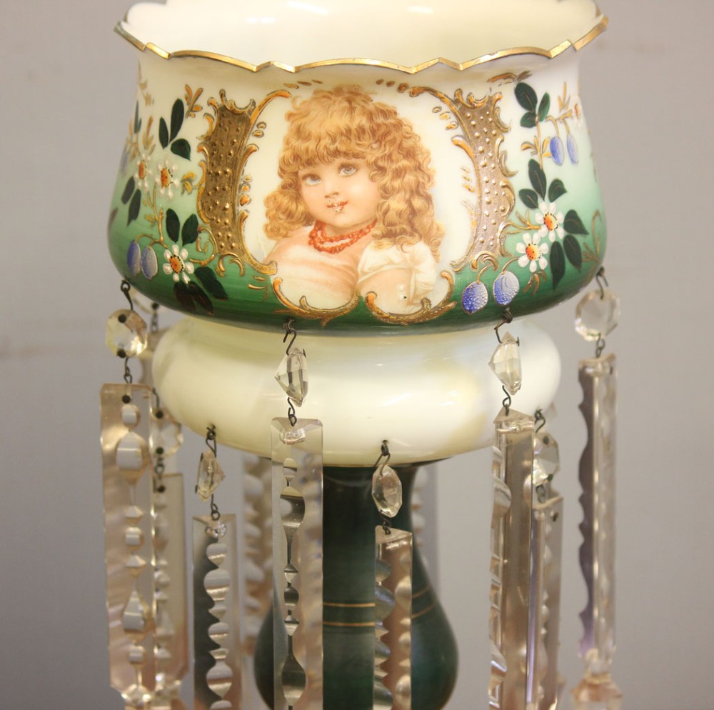 A Victorian opaque white and green glass mantle lustre featuring a hand-painted portrait vignette of a child, floral enamel accents, and suspended crystal prisms. View III