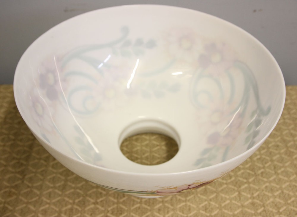 A domed white opaline glass oil lamp shade decorated with hand-painted pink floral motifs and green foliage. View V