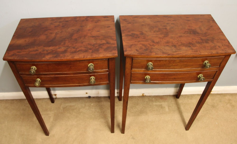 A pair of slim mahogany bedside tables, each featuring two drawers with brass knobs and tall square tapered legs. View III