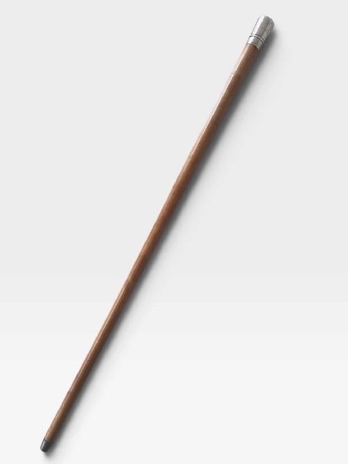 An antique malacca wood walking cane featuring a polished silver collar and cap. View VIII