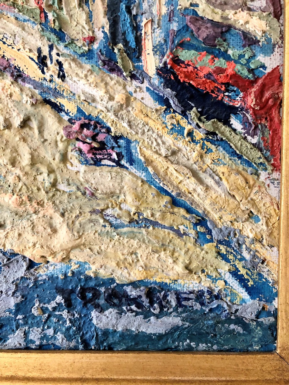 A framed mid-century oil painting depicting a Paris street scene rendered in heavy impasto strokes with yellow, blue, and pink tones inside a molded gold frame. View V