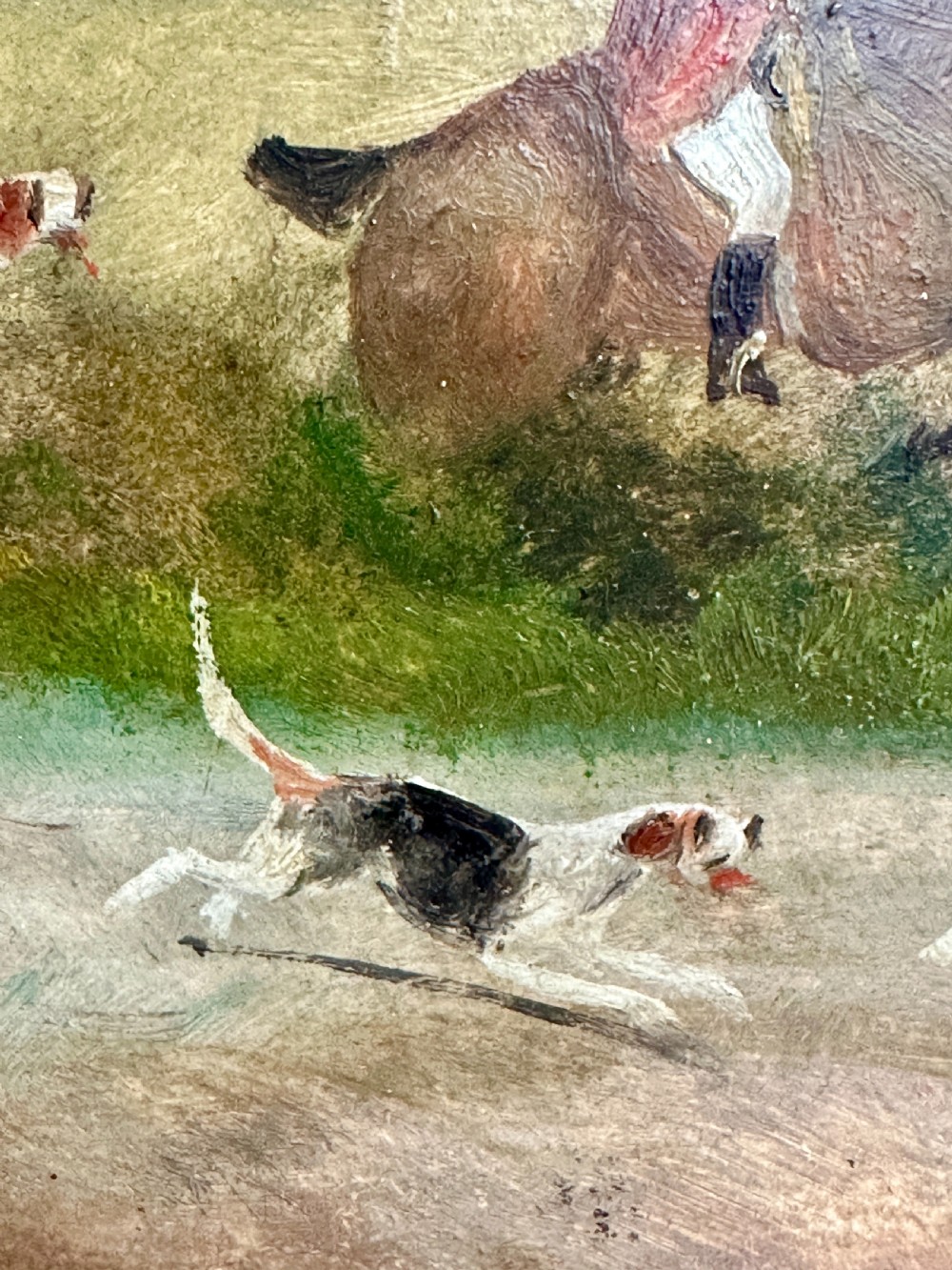 A pair of framed Edwardian oil paintings depicting horse-drawn coaches and fox hunting scenes within carved giltwood frames. View XI