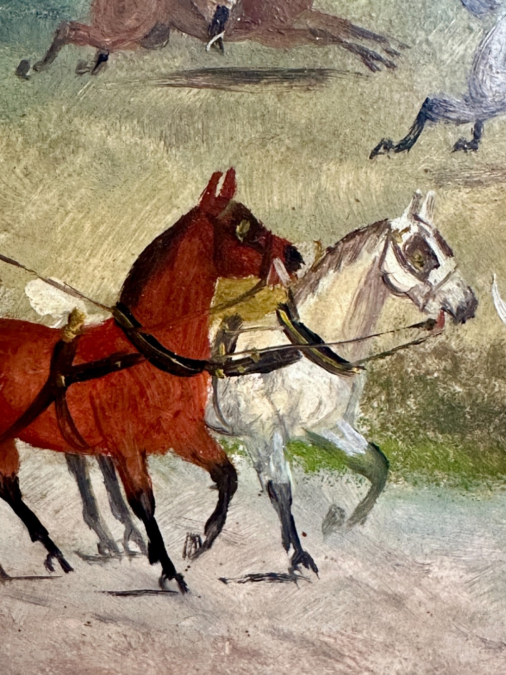 A pair of framed Edwardian oil paintings depicting horse-drawn coaches and fox hunting scenes within carved giltwood frames. View XII