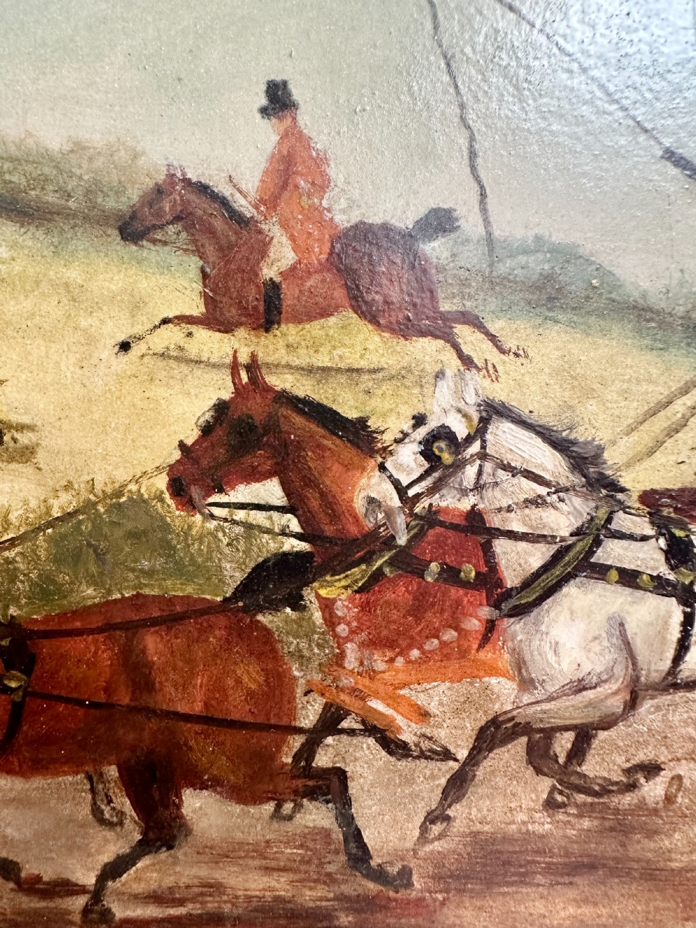 A pair of framed Edwardian oil paintings depicting horse-drawn coaches and fox hunting scenes within carved giltwood frames. View XVIII