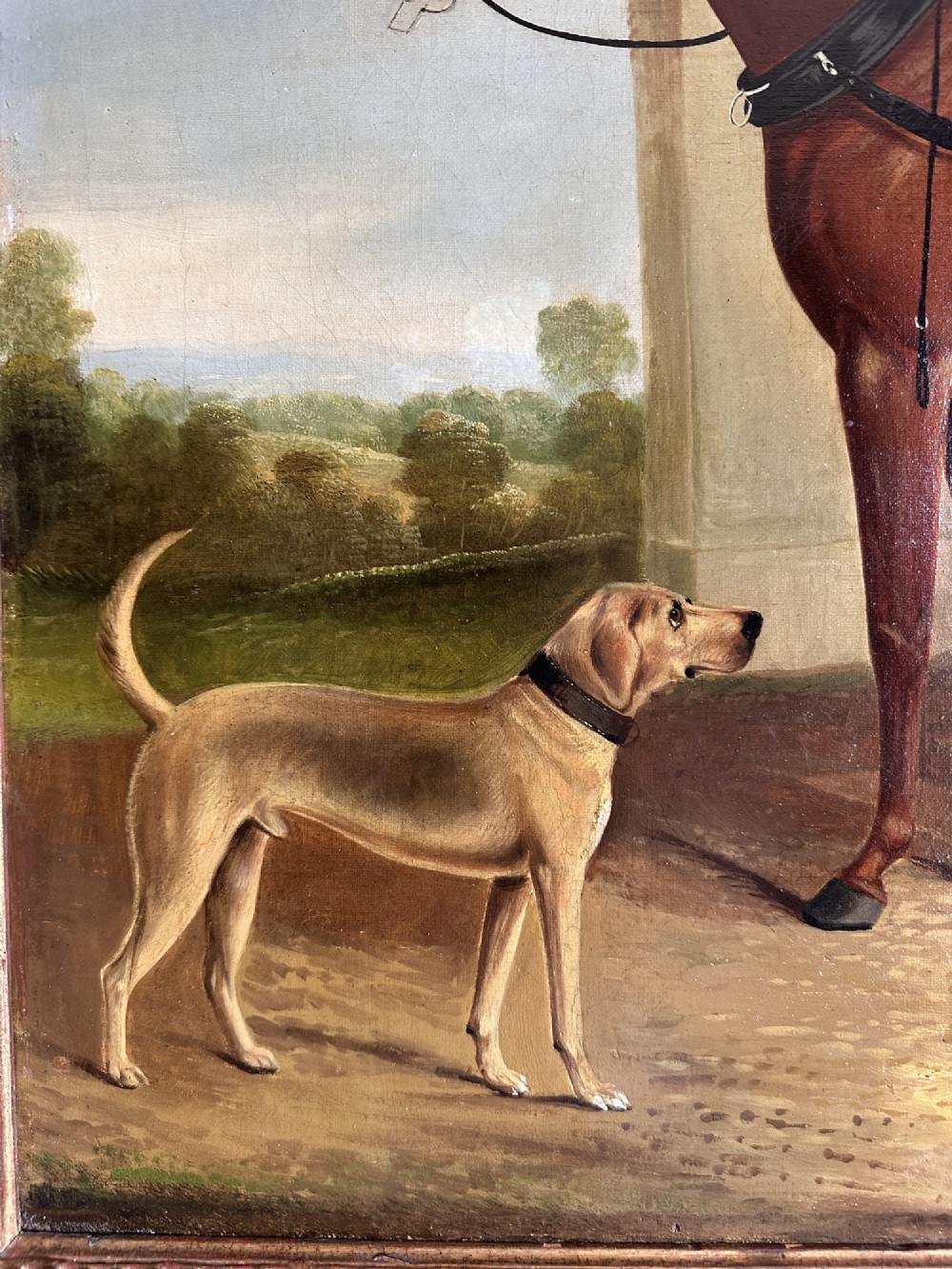 A 19th-century oil painting depicting two brown carriage horses in harness standing beside a hound, set within a beaded gilt frame. View III