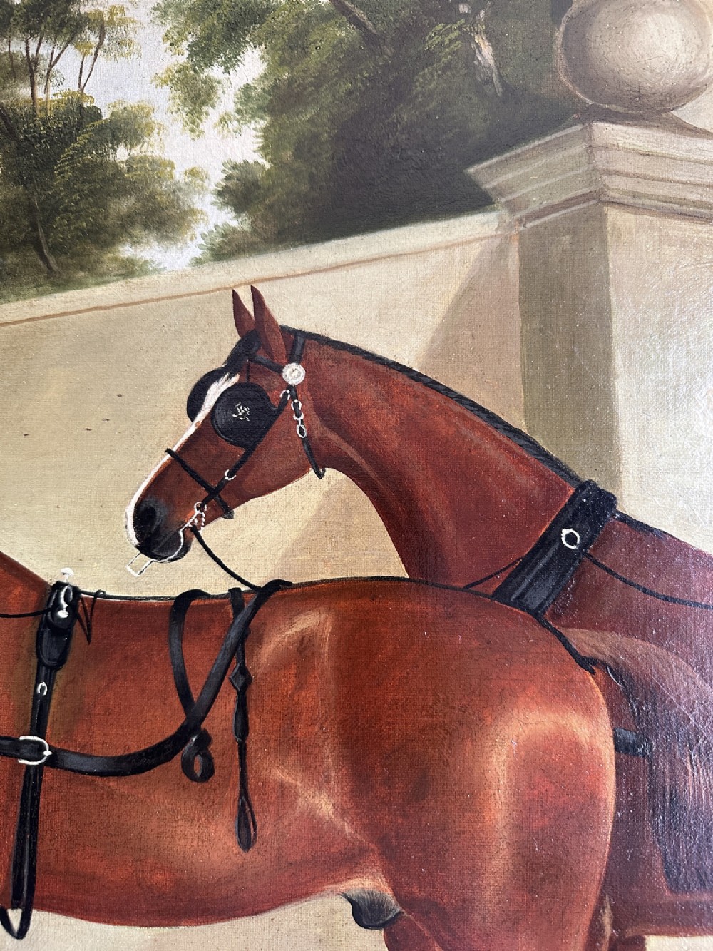 A 19th-century oil painting depicting two brown carriage horses in harness standing beside a hound, set within a beaded gilt frame. View VI