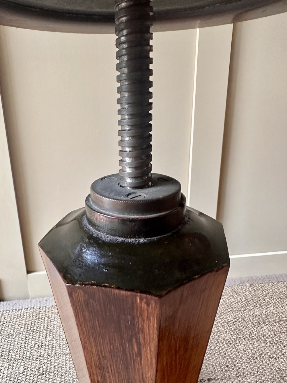 A William IV mahogany adjustable piano stool with a circular green velvet upholstered seat, supported by a faceted tapered column on a triform base. View III