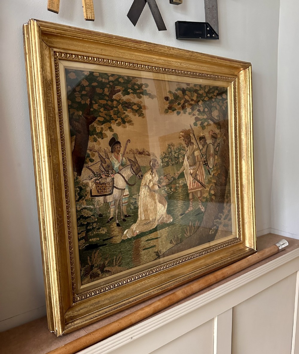 A framed Regency silk and chenille embroidery picture depicting the biblical narrative of Abigail before King David within a moulded gilt frame. View III