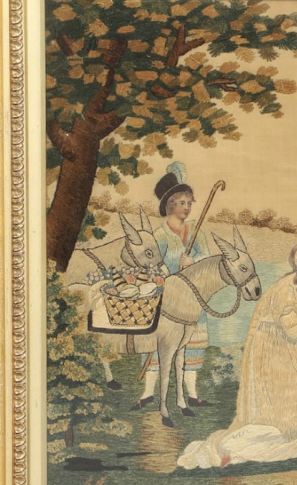 A framed Regency silk and chenille embroidery picture depicting the biblical narrative of Abigail before King David within a moulded gilt frame. View V